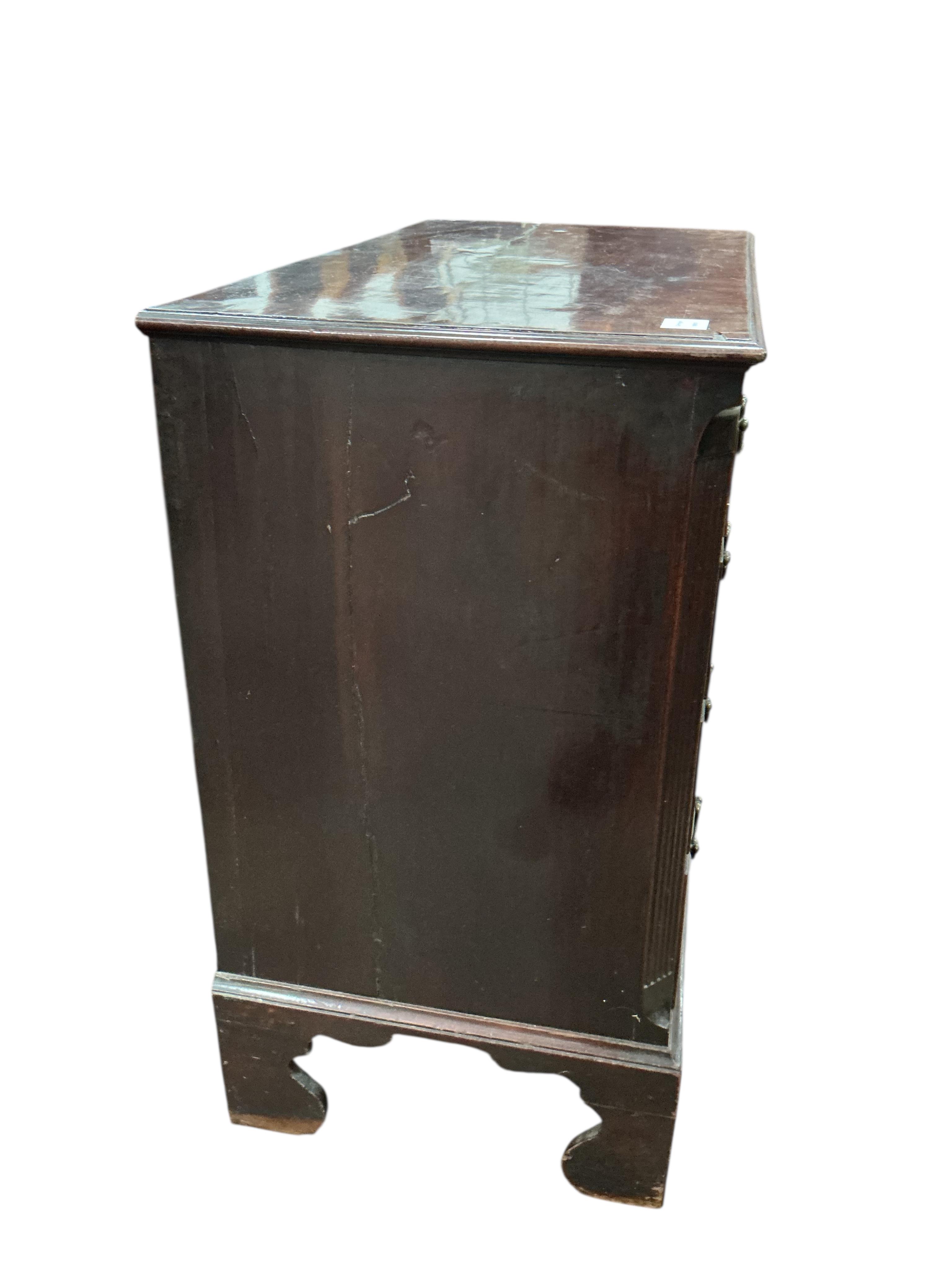 A George III mahogany chest of four drawers with brushing slide, width 87cm, depth 46cm, height 86cm